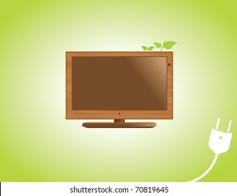 A LCD television with a wooden frame, leaves and a ladybug, on a green background.