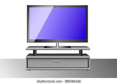 Lcd widescreen flat TV set on a shelf.