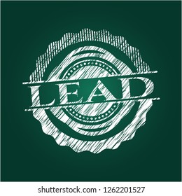 lead written on a blackboard