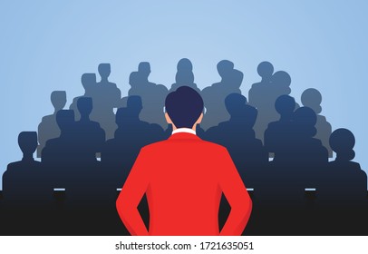 Leader stands in front of a group of people speaking