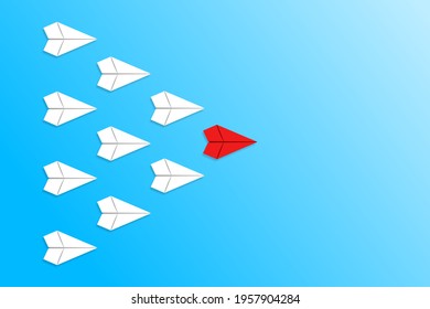 Leadership and competition concept, with red paper plane leading among white.