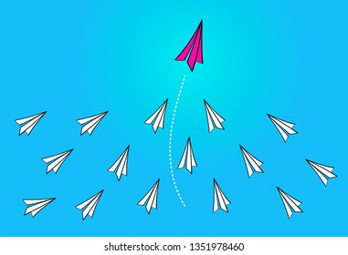 Leadership concept with red paper plane leading white paper planes  on blue background
