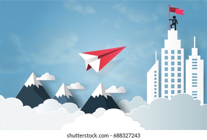 Leadership concept, Red plane flying on sky with cloud over mountain and architectural building with man on top holding flag, Symbol of success, achievements in business life (Paper art style)
