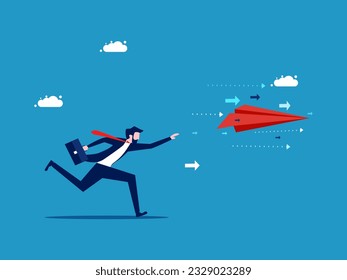 Leadership and progress. Businessman runs and grabs a paper plane