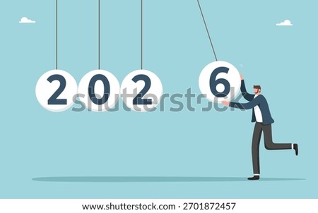 Leadership in setting plan or course for business development in 2026, motivation in achieving goals in future year, determination for great success or heights, man launches 2026 balls into work.