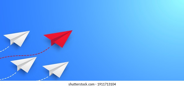 Leadership success business concept paper plane fly over blue background. New idea, courage, new thinking, creative decision, think differently. Lead airplane stand out of other paper plane follower.