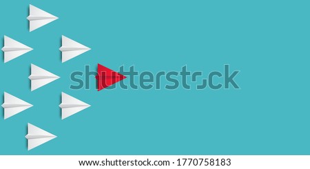 Leadership success concept paper plane fly over blue background. New idea, courage, new thinking, creative decision, think differently. Lead airplane stand out of other paper plane follower
