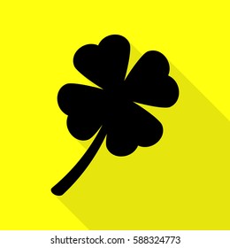 Leaf clover sign. Black icon with flat style shadow path on yellow background.