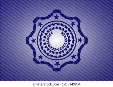 leaf crown icon inside badge with denim texture