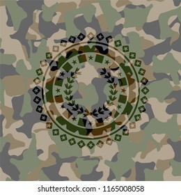 leaf crown icon inside camouflage emblem