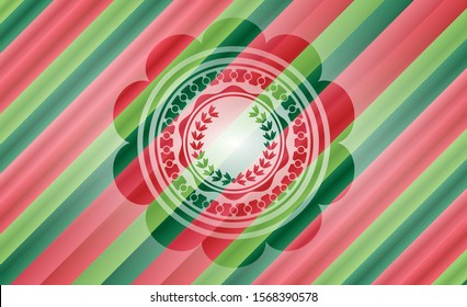 leaf crown icon inside christmas colors badge.
