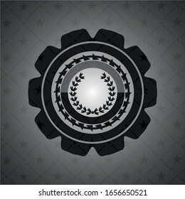 Blattkronensymbol im dunklen Abzeichen oder Emblem