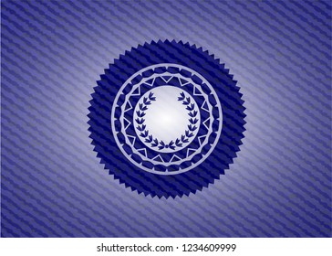 leaf crown icon inside denim background
