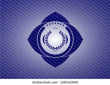 leaf crown icon inside emblem with denim high quality background