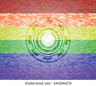 leaf crown icon inside emblem on mosaic background with the colors of the LGBT flag