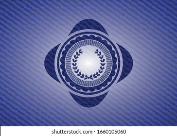 leaf crown icon inside emblem with jean background