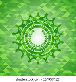 leaf crown icon inside green emblem with triangle mosaic background