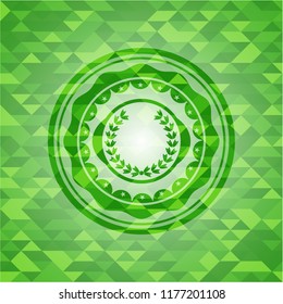 leaf crown icon inside realistic green mosaic emblem