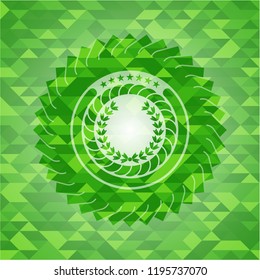leaf crown icon inside realistic green mosaic emblem