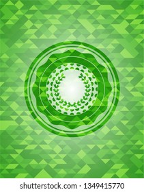 leaf crown icon inside realistic green mosaic emblem