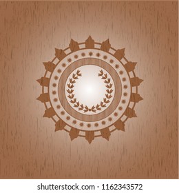 leaf crown icon inside retro wooden emblem