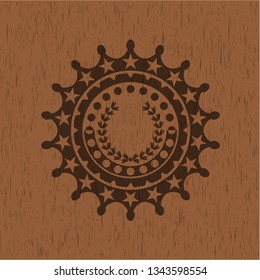 leaf crown icon inside vintage wood emblem