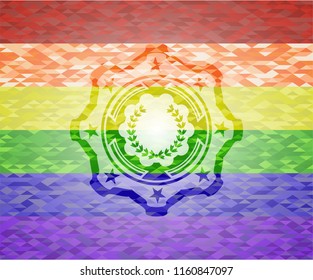 leaf crown icon on mosaic background with the colors of the LGBT flag