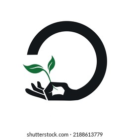 Logo de la hoja en mano. Símbolo de vida orgánica

