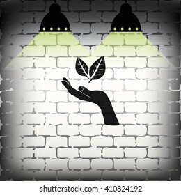 Leaf in a hand sign of environmental protection icon. Eco sign.