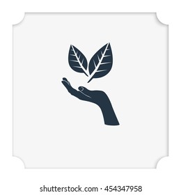 Leaf in a hand sign of environmental protection icon. Eco sign.