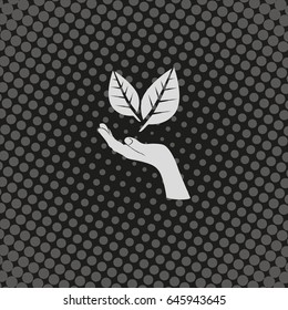 Leaf in a hand sign of environmental protection icon. Eco sign.