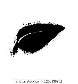 leaf icon. Black ink with splashes on white background
