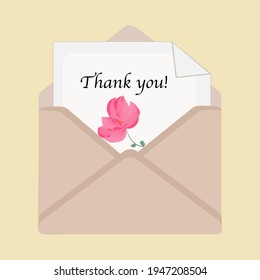 A leaf with the inscription Thank you with a flower in an envelope on a yellow background