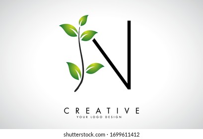 Leaf Letter N Logo Design with Green Leaves on a Branch. Letter N with nature concept. Eco and Organic Letter Vector Illustration. 