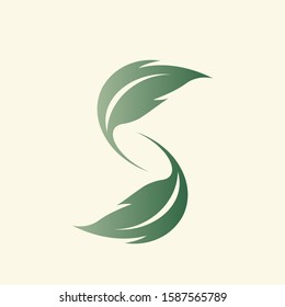 Leaf letter S logo.Nature elements typographic icon.Alphabet initial for beauty, health care, ecological lifestyle brand.Lettering sign.Character green plant shape isolated on light background.