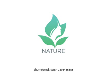 Leaf logo formed negative space of women face in green color