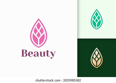 Logo de la hoja en estilo simple y femenino para el negocio de la salud y la belleza