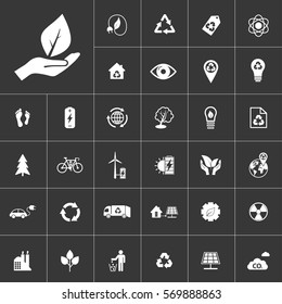 leaf on hand. ecology and alternative energy icon set at gray background. Natural renewable energy technologies as solar, wind, water, geothermal heat, bio fuel.
