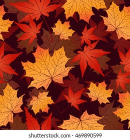 Leaf seamless pattern, vector background. Autumn yellow and red leaves on a dark background. For the design of wallpaper, fabric, decoration material