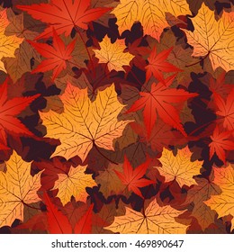 Leaf seamless pattern, vector background. Autumn yellow and red leaves on a dark background. For the design of wallpaper, fabric, decoration material
