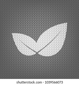Leaf sign illustration. Vector. White knitted icon on gray knitted background. Isolated.