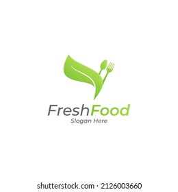 leaf with spoon and fork. fresh food logo design