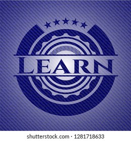 Learn badge with denim background