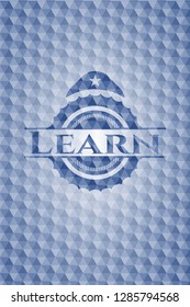Learn blue hexagon emblem.