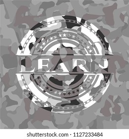 Learn on grey camouflage texture