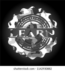 Learn on grey camouflaged texture