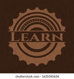 Learn realistic wood emblem. Vector Illustration.