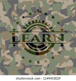 Learn written on a camouflage texture