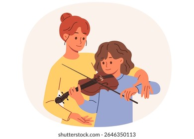Learning to play violin for teenage girl, from professional teacher who helps to hold bow correctly. Caring mother teaches daughter to perform music on violin, practicing before concert with audience