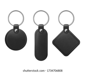 Leather keychain, holder trinket for key with metal ring. Vector realistic template of black fob for home, car or office isolated on white background. Blank accessory for corporate identity